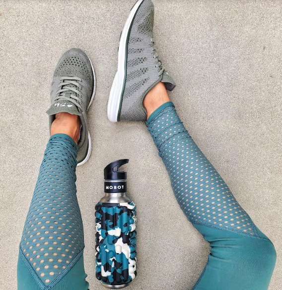 blue sport leggings sport shoes and blue Mobot foam roller water bottle 